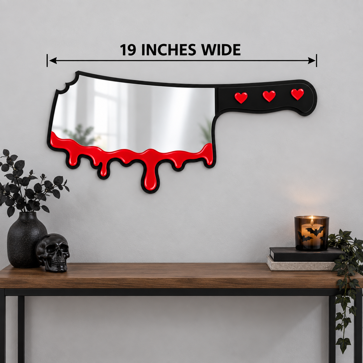 Bloody cleaver horror wall mirror measuring 19 inches wide