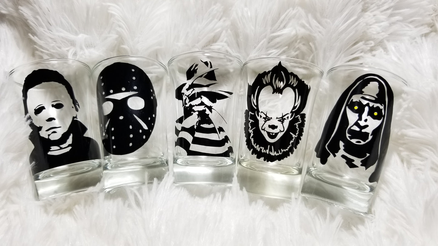 horror shot glasses on a white background 