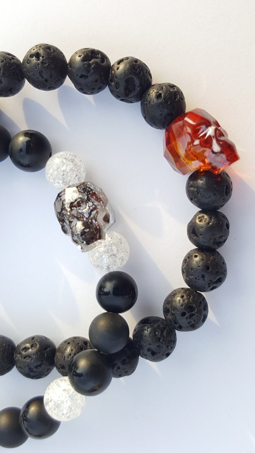 Skull Bracelet, Black Lava and Swarovski Crystal Skull bead in Fire Orange and  Speckle Black - CCCreationz